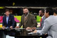Jason Kelce (2nd L) and Randy Moss (3rd L), both former NFL players and analysts, chuckle before to the Kansas City Chiefs vs. Philadelphia Eagles Super Bowl LIX on February 09, 2025, in New Orleans, Louisiana, at Caesars Superdome. (Photo by Gregory Shamus/Getty Images)